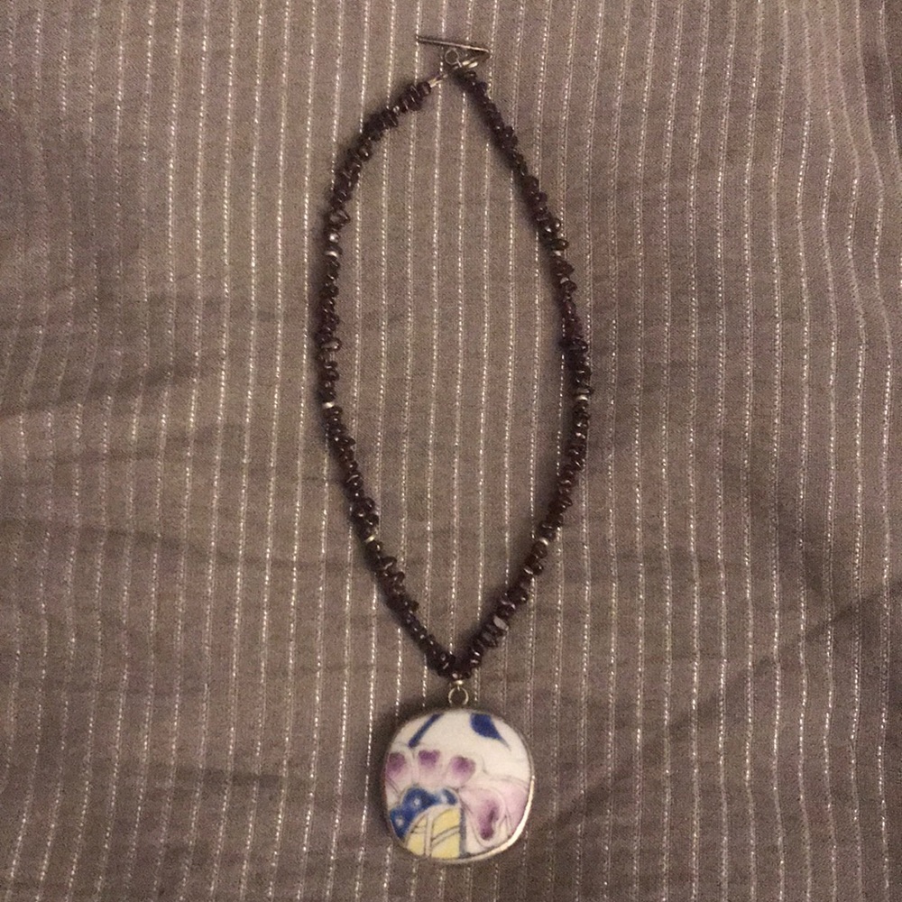 Necklace with floral pendant